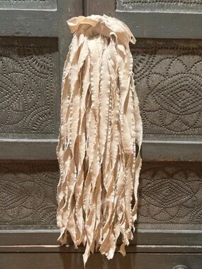 90 Hand Torn tea dyed muslin fabric strips.   Approx 90, Length 44 “, Width Vary